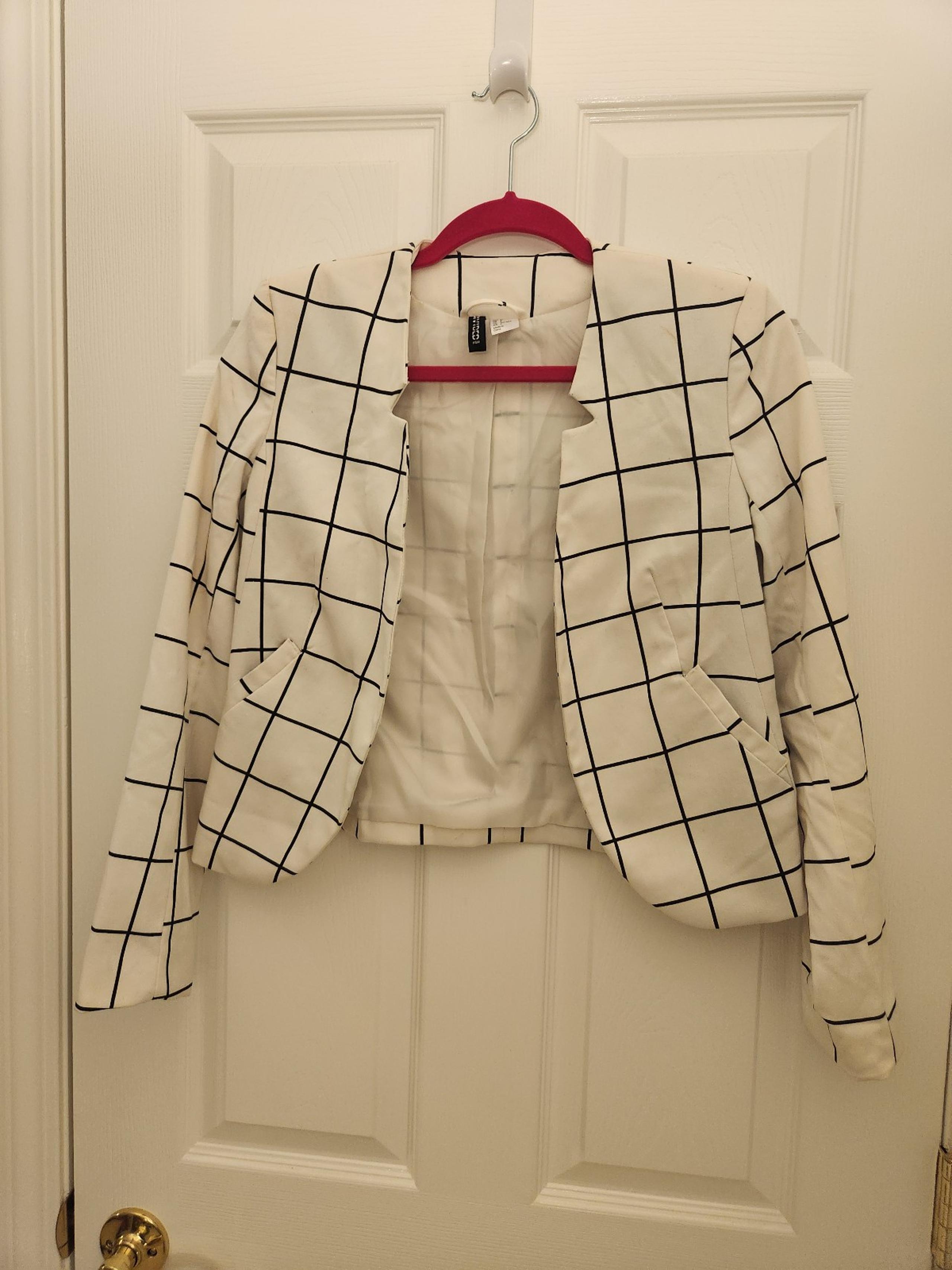 White and black blazer
