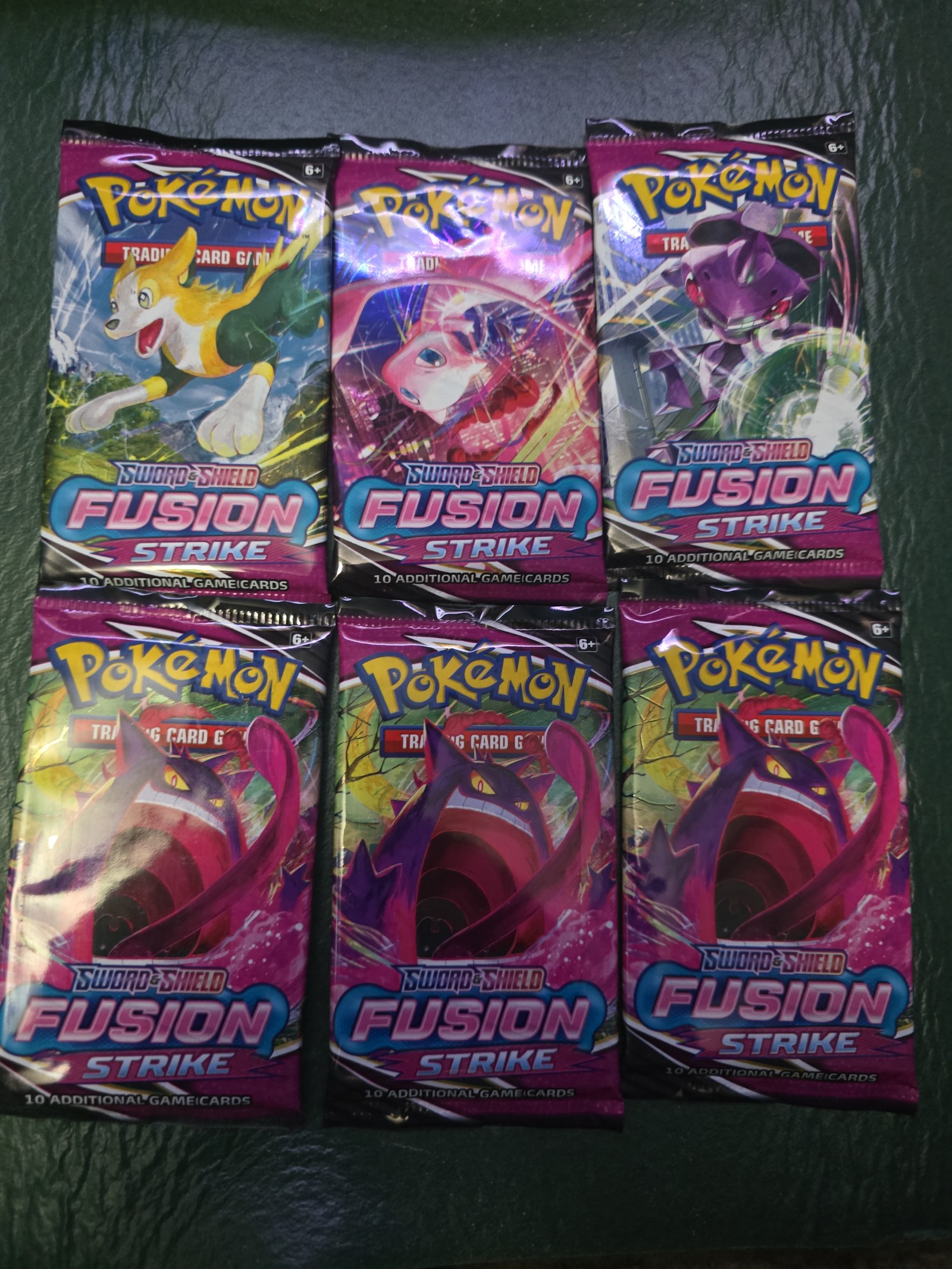 6 sealed fusion strike booster pack