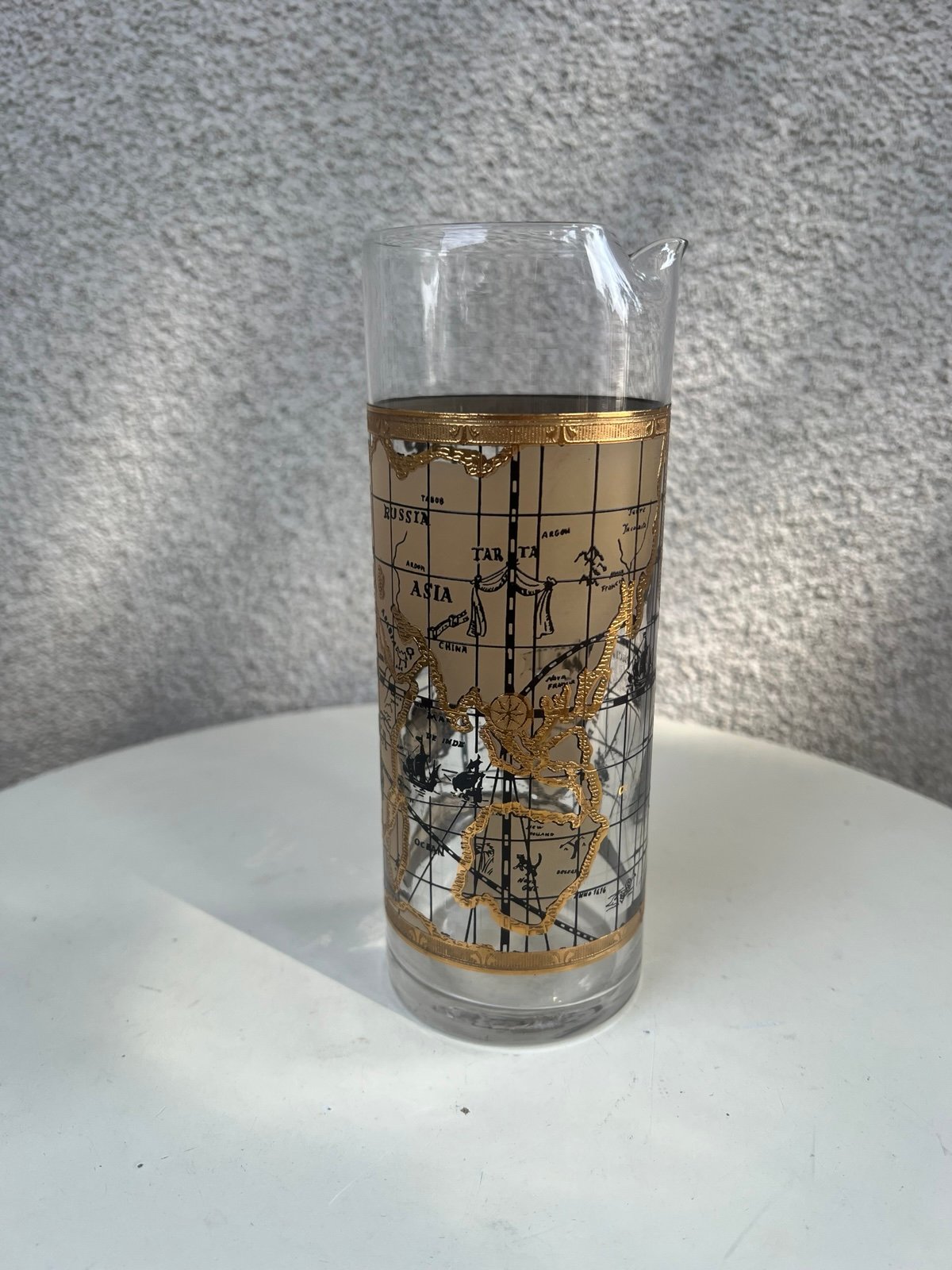 Vintage MCM barware pitcher world map theme gold leaf by Cera size 8” x 3”.