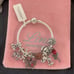 Linx Snake Chain Bracelet with Skull and Voodoo Doll Themed Charms