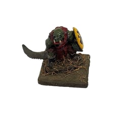 Sword wielding orc warlord with shield on stone slate spare game piece home deco