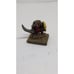 Sword wielding orc warlord with shield on stone slate spare game piece home deco