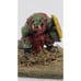 Sword wielding orc warlord with shield on stone slate spare game piece home deco