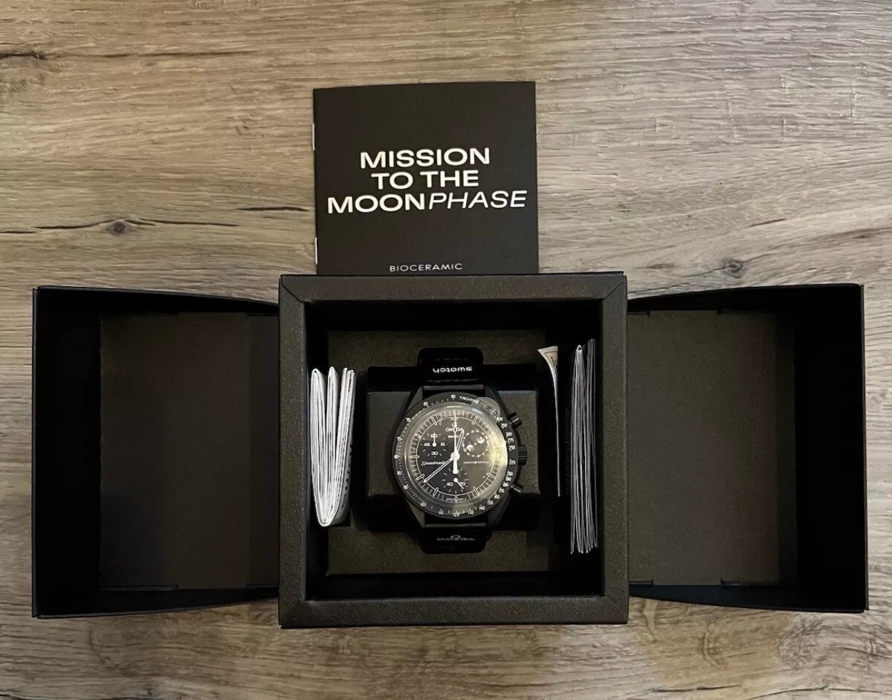(2) SWATCH X OMEGA SNOOPY BLACK/WHITE MOONSWATCH MOONPHASE- NEW MOON