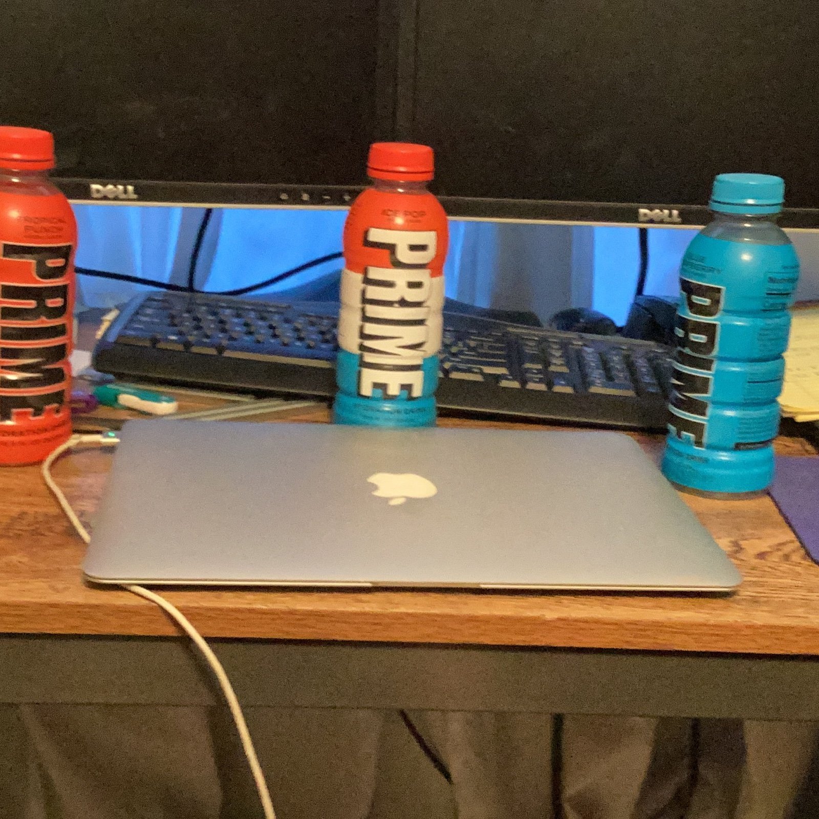 Prime bottles Ice Pop, Blue Raspberry, and Tropical Punch