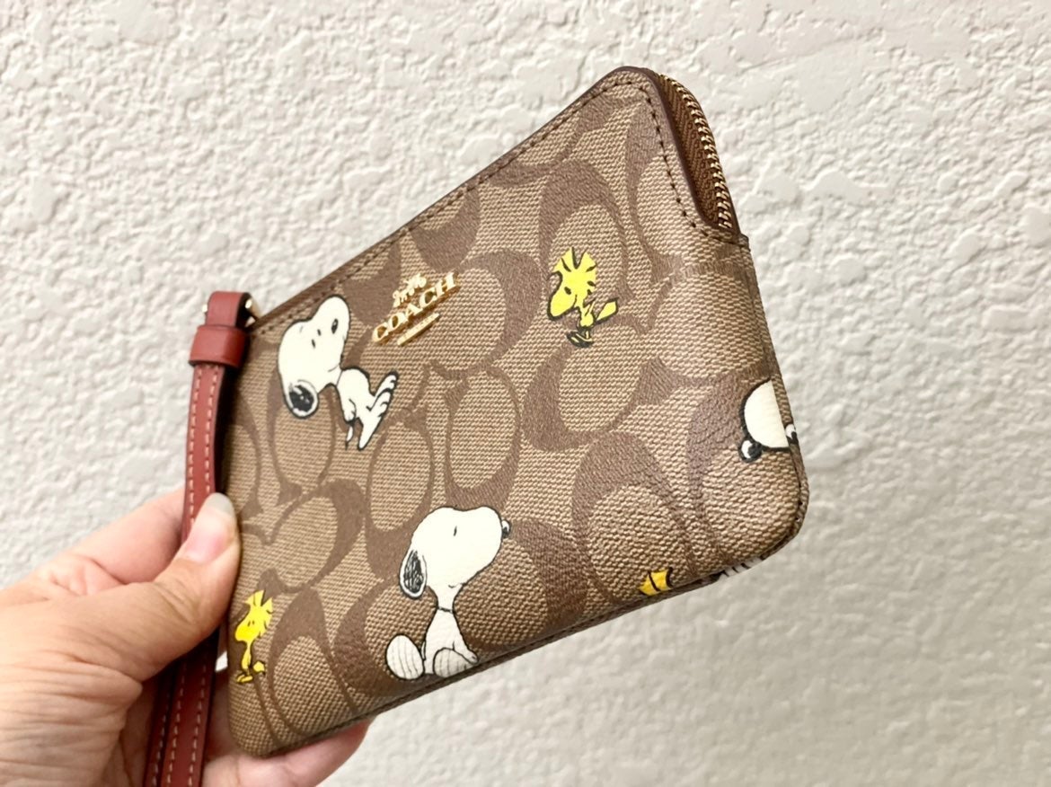 Coach X Peanuts Corner Zip Wristlet In Signature Canvas With