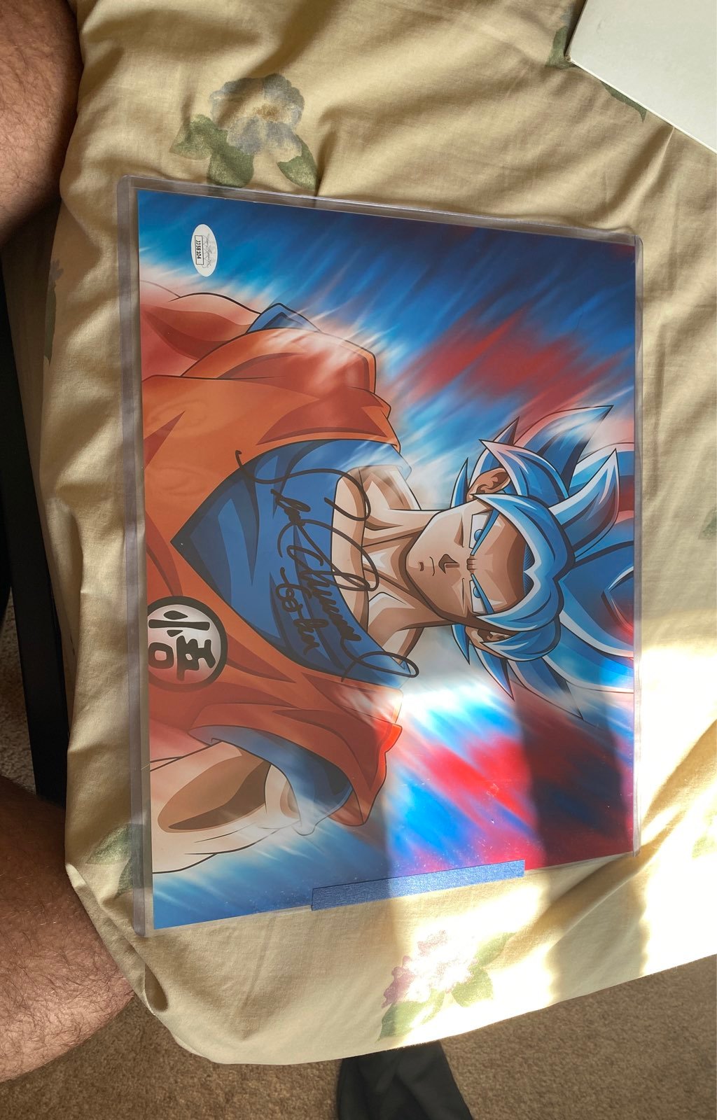 DB Super signed Goku photo