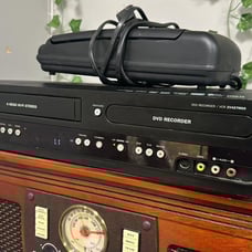 MagnavoxDVD Recorder & VCR With VHS Tape Rewinder & 36 VHS Tapes Included