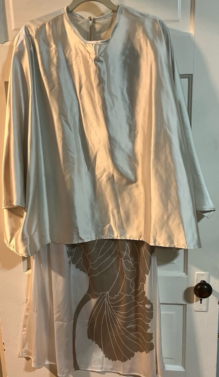 Gold, silk two piece skirt and cape with sleeve holes. Women’s size 12-14.
