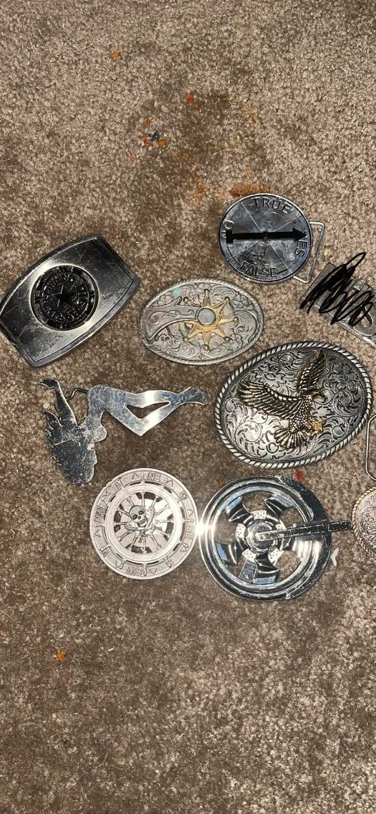 (9) belt buckles