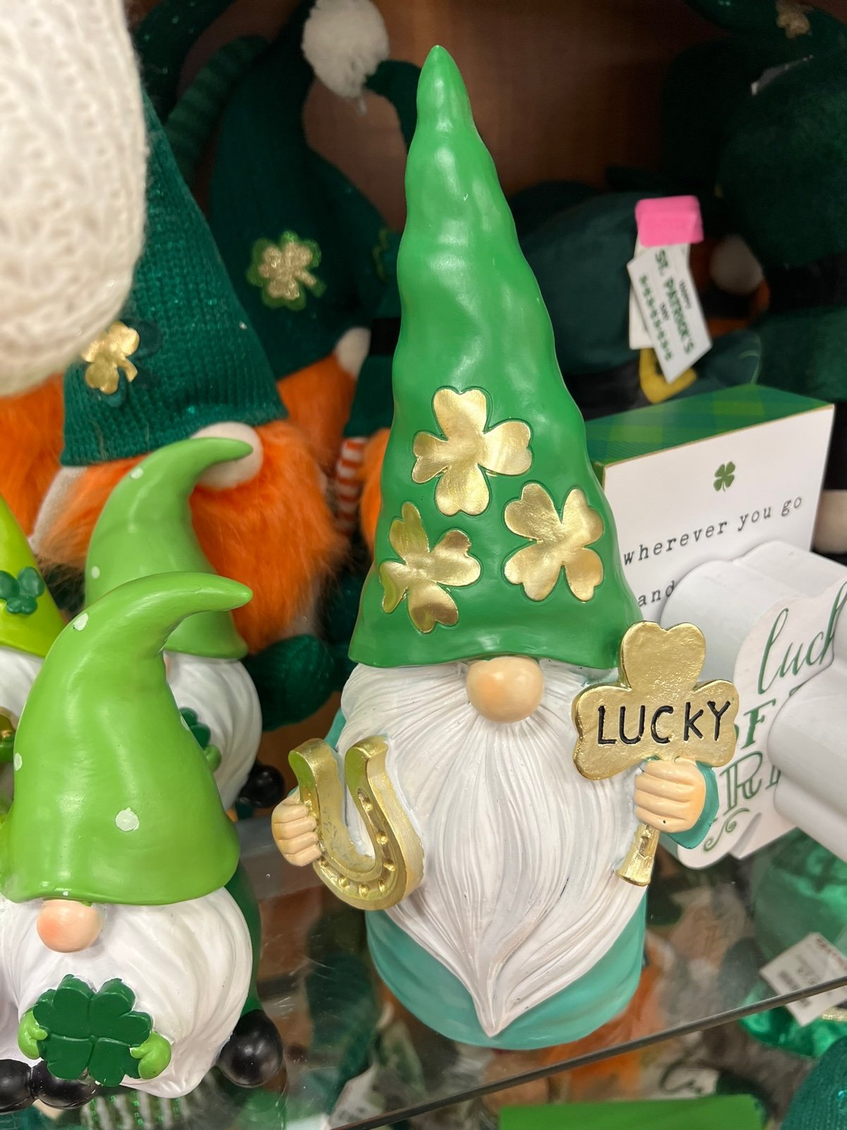 St Patricks Day Gnome holding a gold shamrock