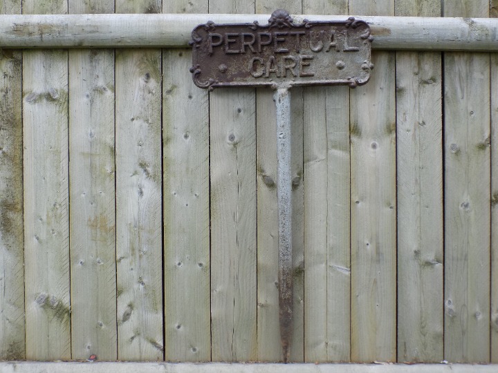 Vintage Perpetual Care Embossed Cast Iron Funeral Sign