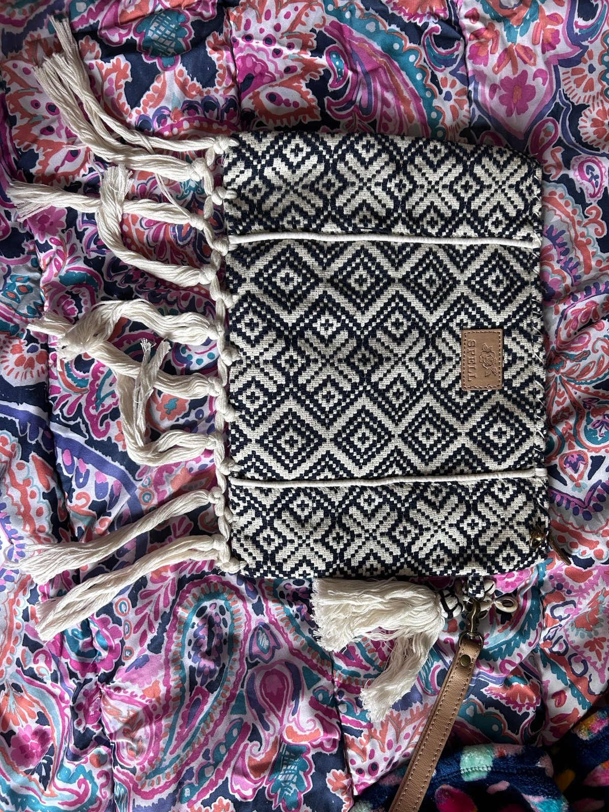 Spell wristlet