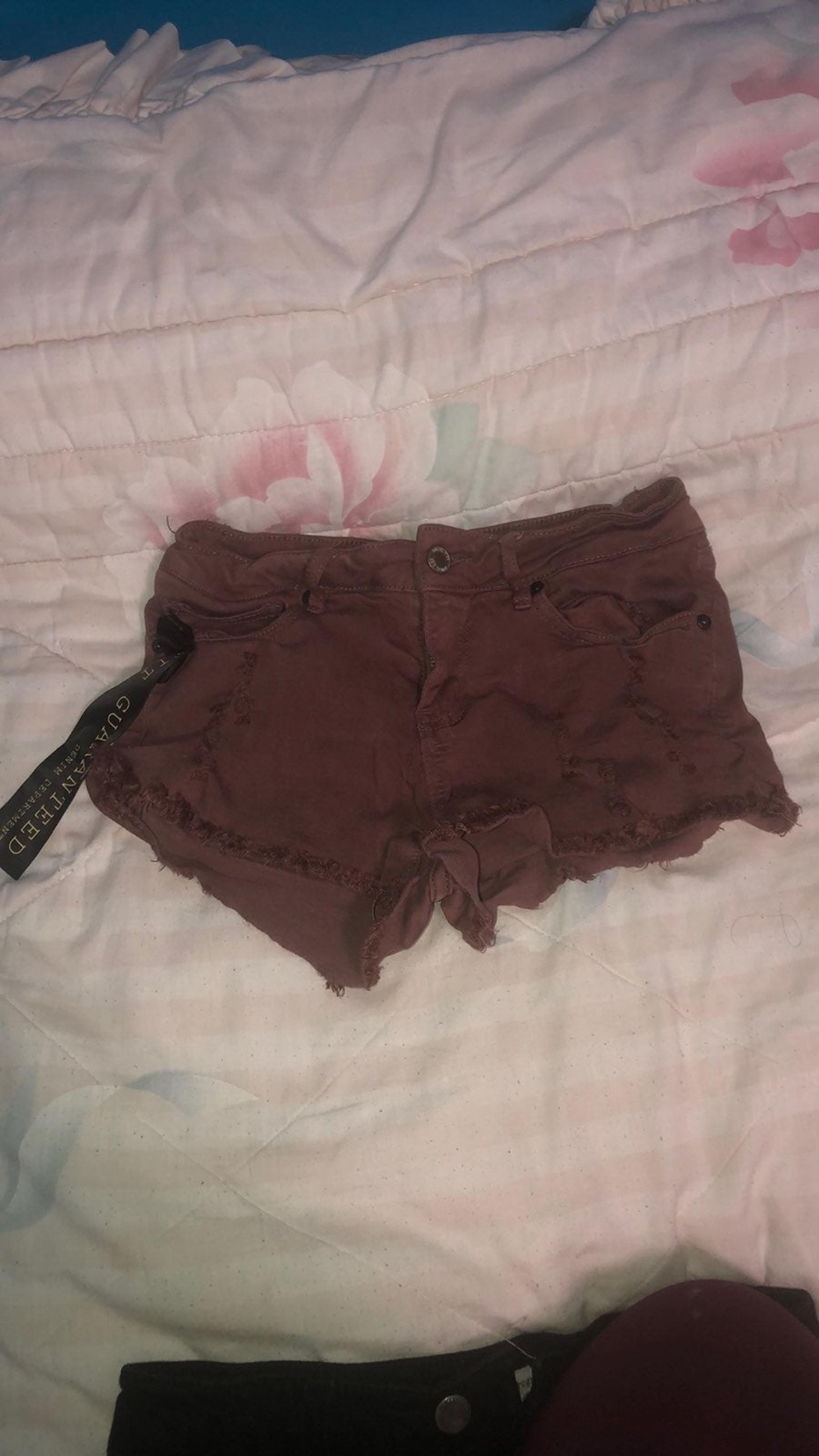 Angel kiss distressed shorts women