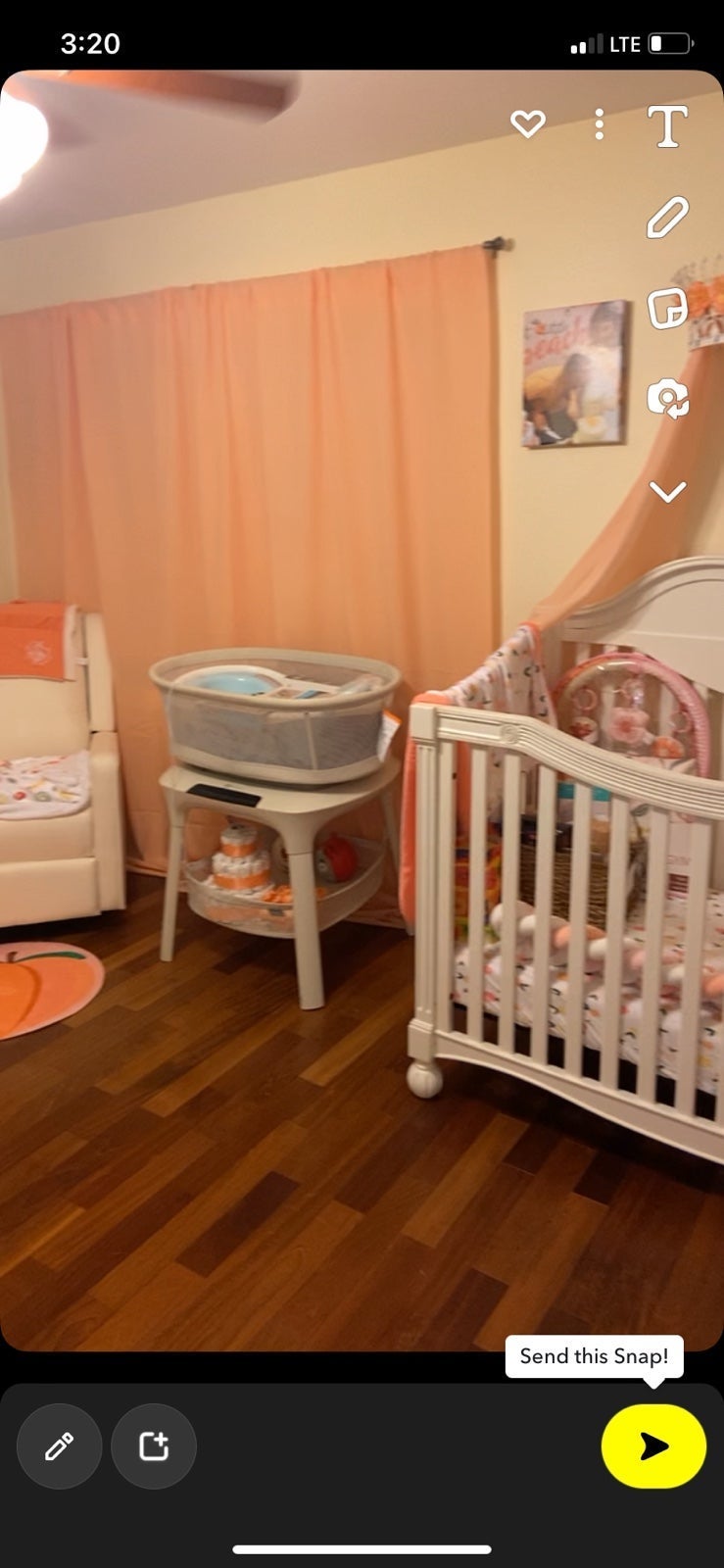 Peach themed baby nurseryy