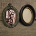 Disneyland oval frame haunted Mansion and Disney black and gold 5x7 set of 2
