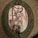 Disneyland oval frame haunted Mansion and Disney black and gold 5x7 set of 2