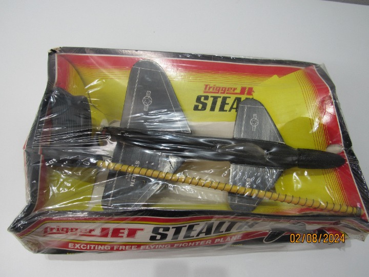 Vtg. Stanzel Trigger Jet stealth strategic fighter Black Airplane NO. 1800