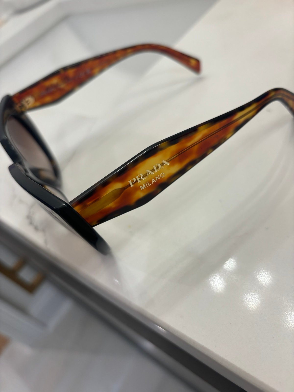 Prada sunglasses with case