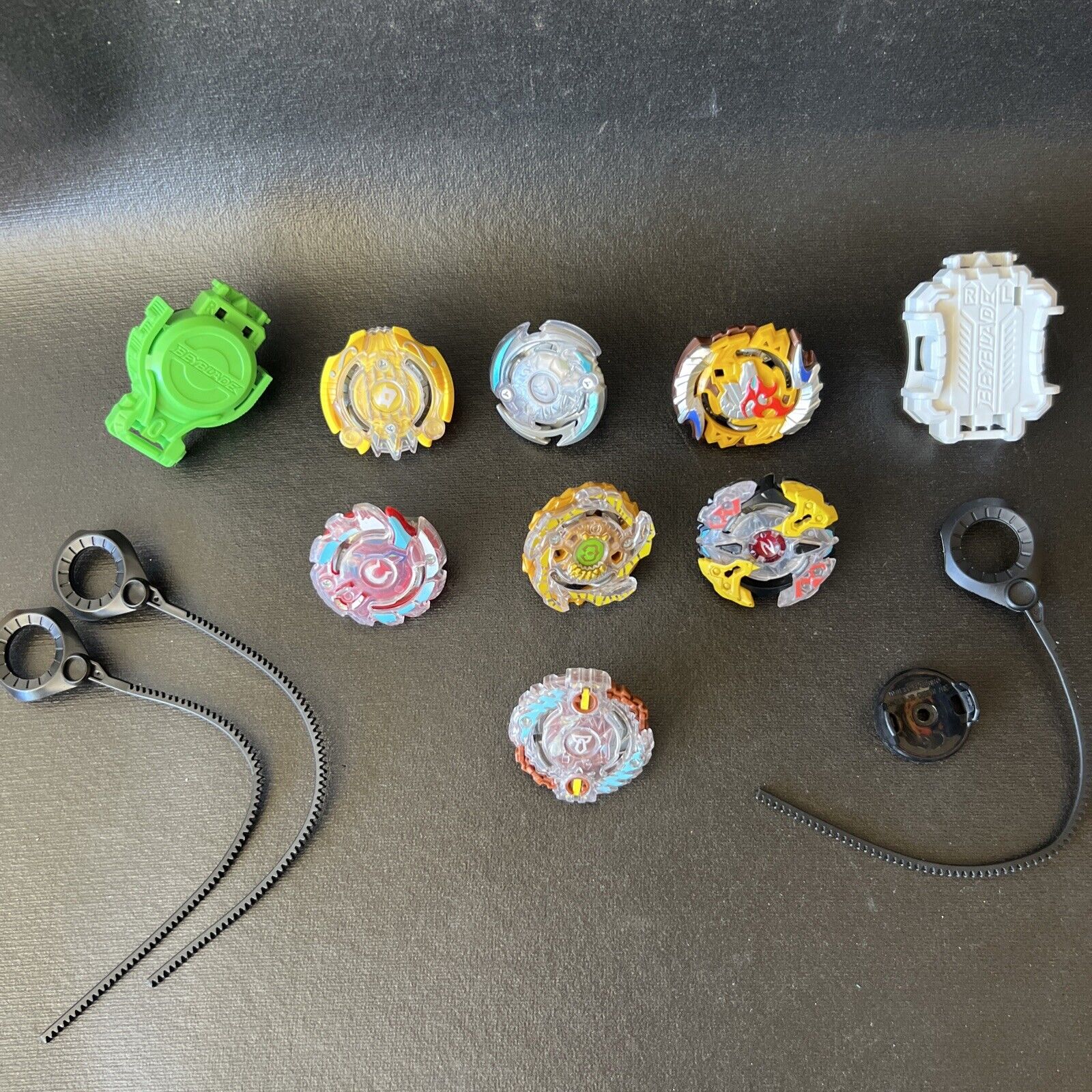 Beyblade Lot Of 7, 2 Launchers, Variety Of Different Years And Colors, Parts