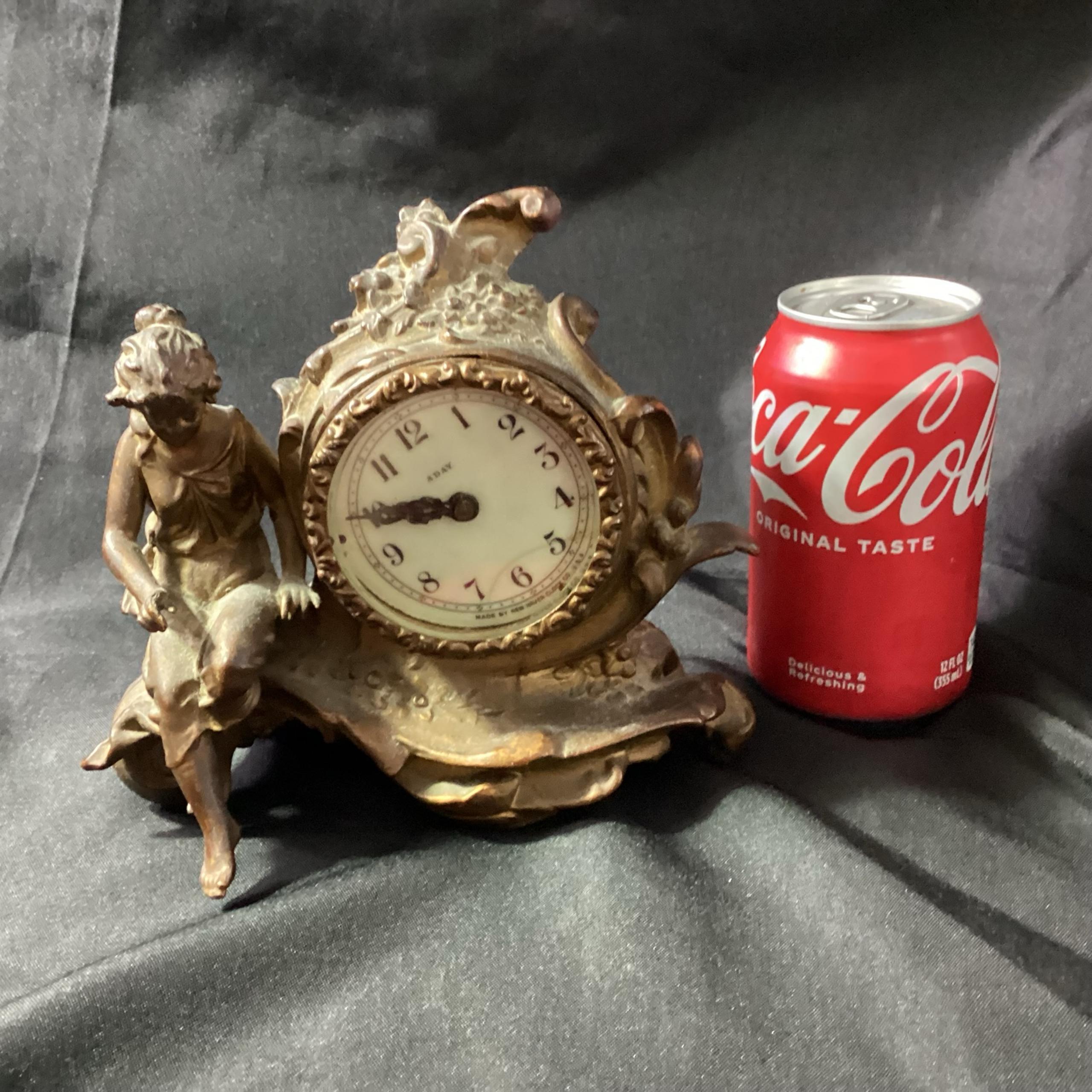 Clock New Haven clock 8 day seated maiden