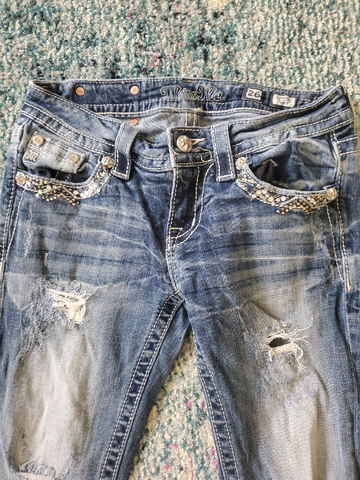 Women's distressed miss me jeans