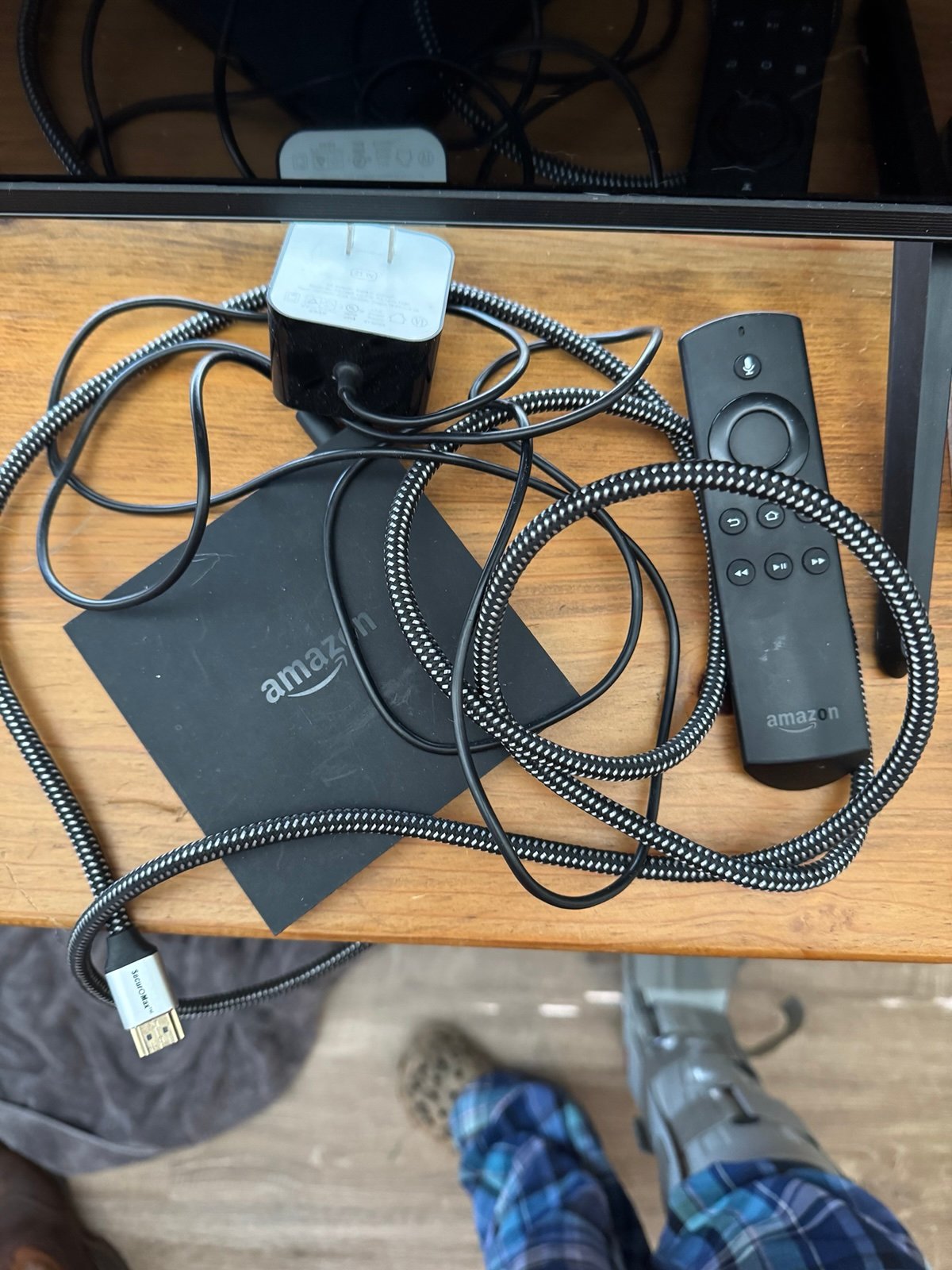 Amazon Fire with cords and remote