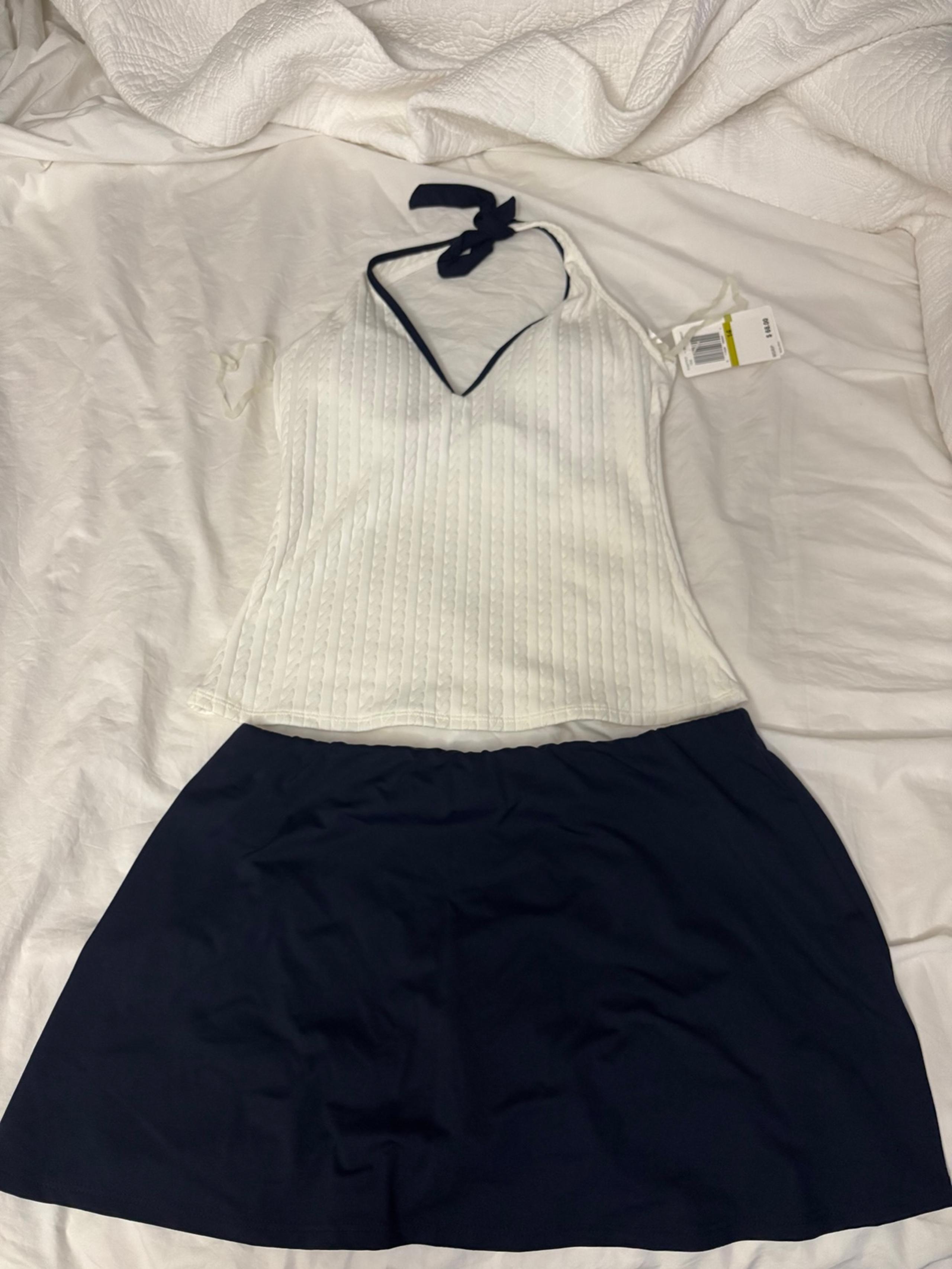 Ladies Nautica. New with all tags.navy blue/white. Top size 12. Bottom size 14.