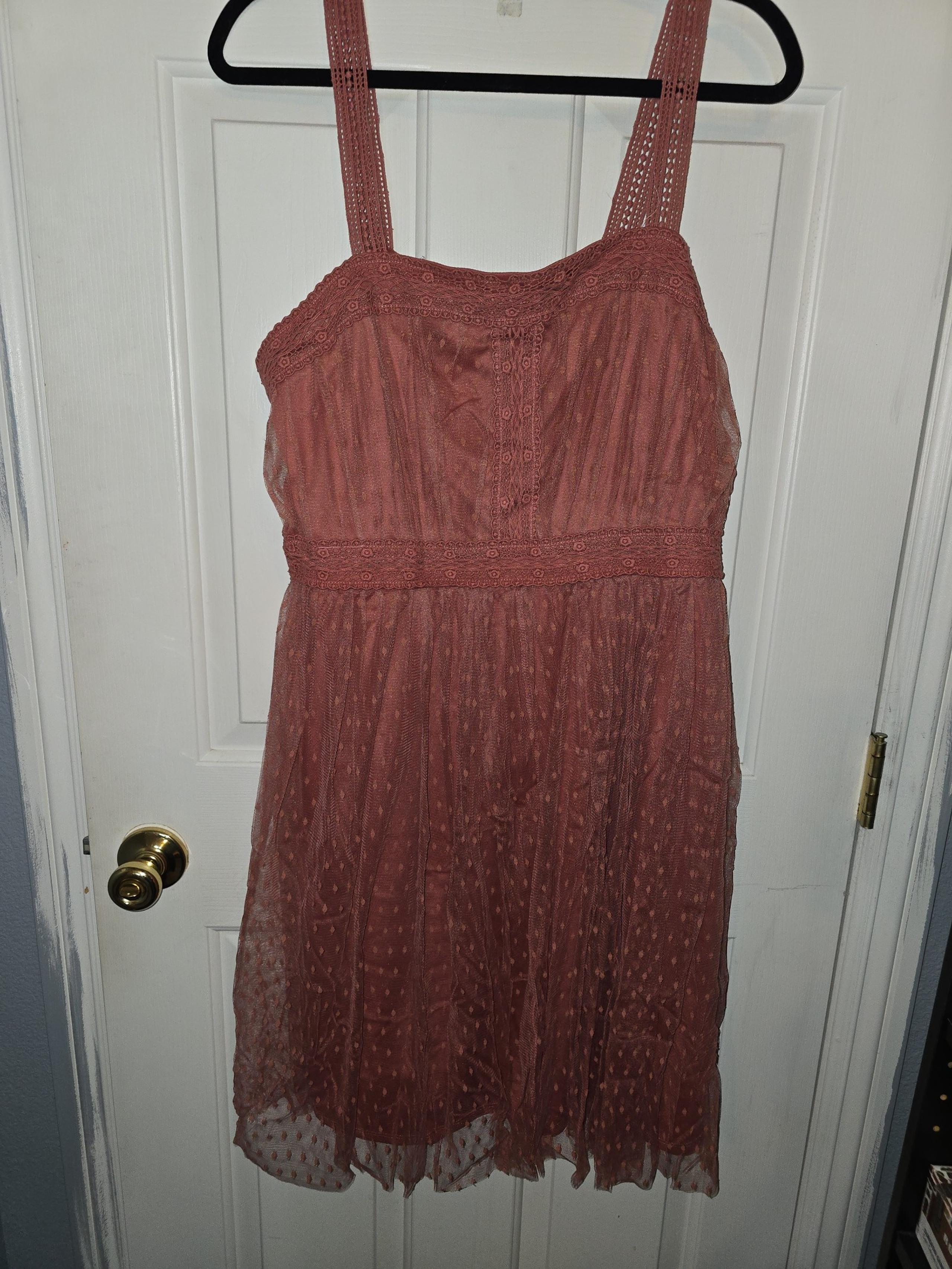 Knee length mauve pink lace dress