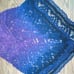 Crocheted lacy shawl with Galaxy motif.