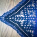 Crocheted lacy shawl with Galaxy motif.