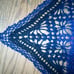 Crocheted lacy shawl with Galaxy motif.