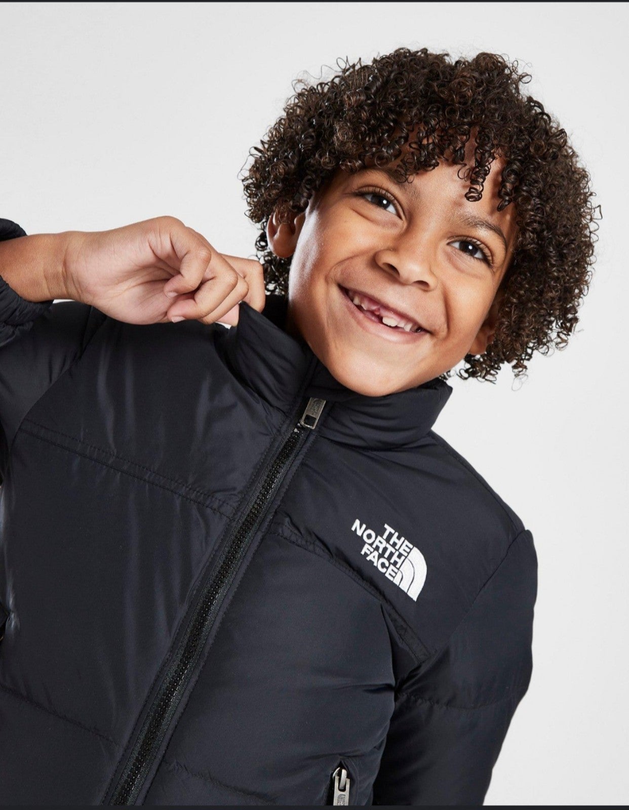 The North Face boy's black jacket like new.