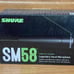 SHURE SM58 legendary vocal microphone used once last Christmas .