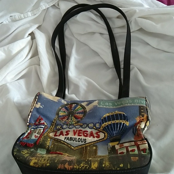 Well loved rhinestone Las Vegas mini bag