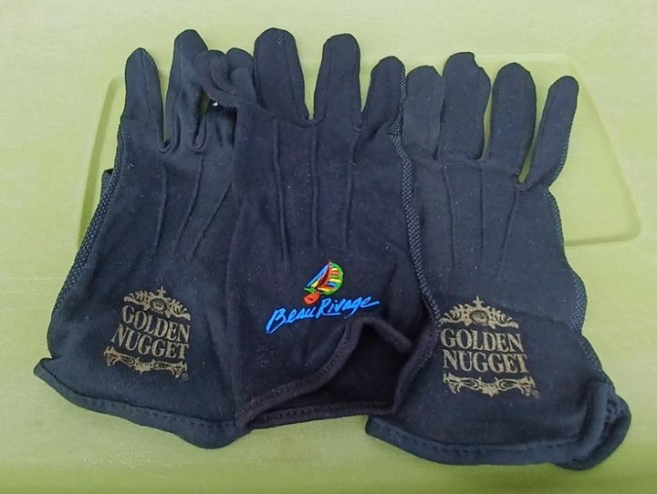 Gloves Two Gloves from the Golden Nugget and One Glove from the Beau Rivage