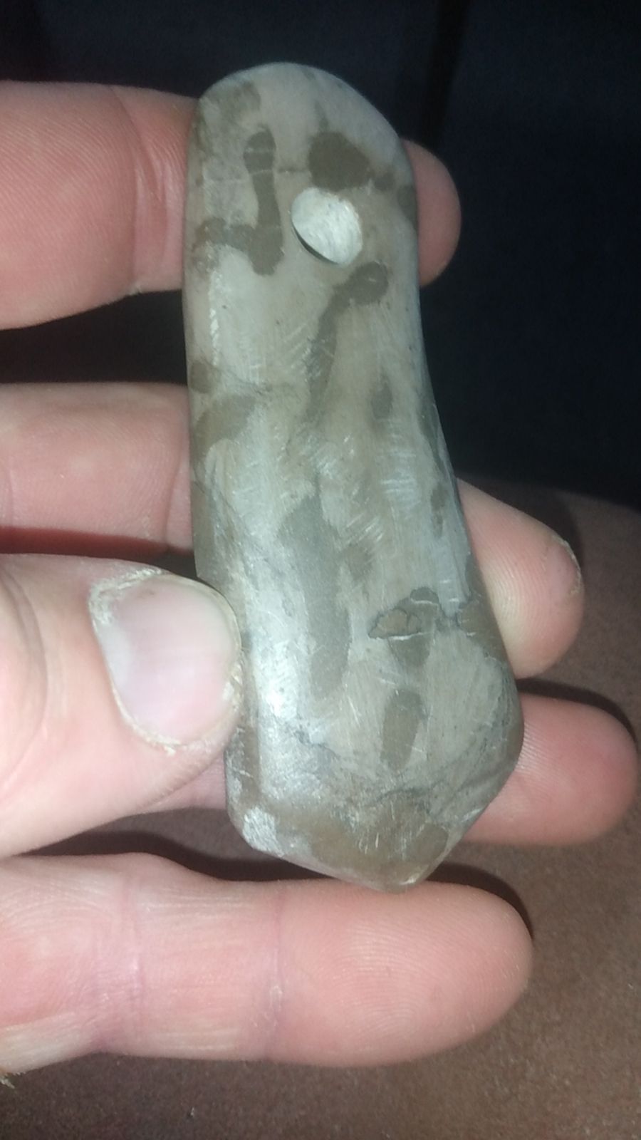 Banded slate pendant artifact