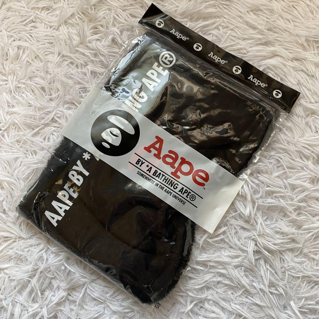 Brand new, unused Aape (A Bathing Ape) neck warmer with fleece lining.