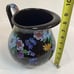 Mackenzie Childs Black Flower Market 8.5”Tall Enameled Pitcher Purple Blue Yell