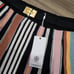 Tory burch gold belted striped sweater skirt