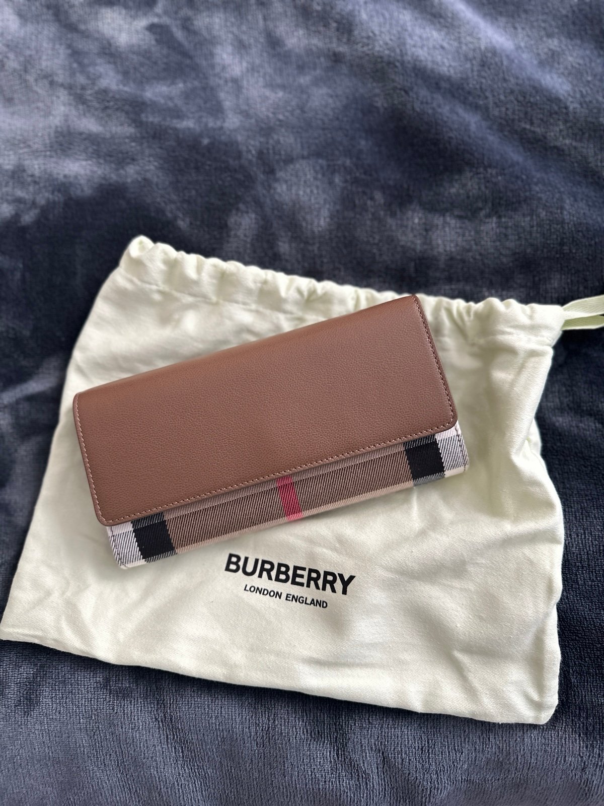 Burberry long wallet.
