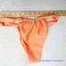 New! Free People Belle the Label The Bare Bikini Bottoms in metallic orange, M