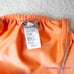 New! Free People Belle the Label The Bare Bikini Bottoms in metallic orange, M