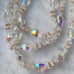 Aurora Borealis 3 Strand Vintage 16 Necklace with Gold toned Flower spacers