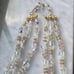Aurora Borealis 3 Strand Vintage 16 Necklace with Gold toned Flower spacers