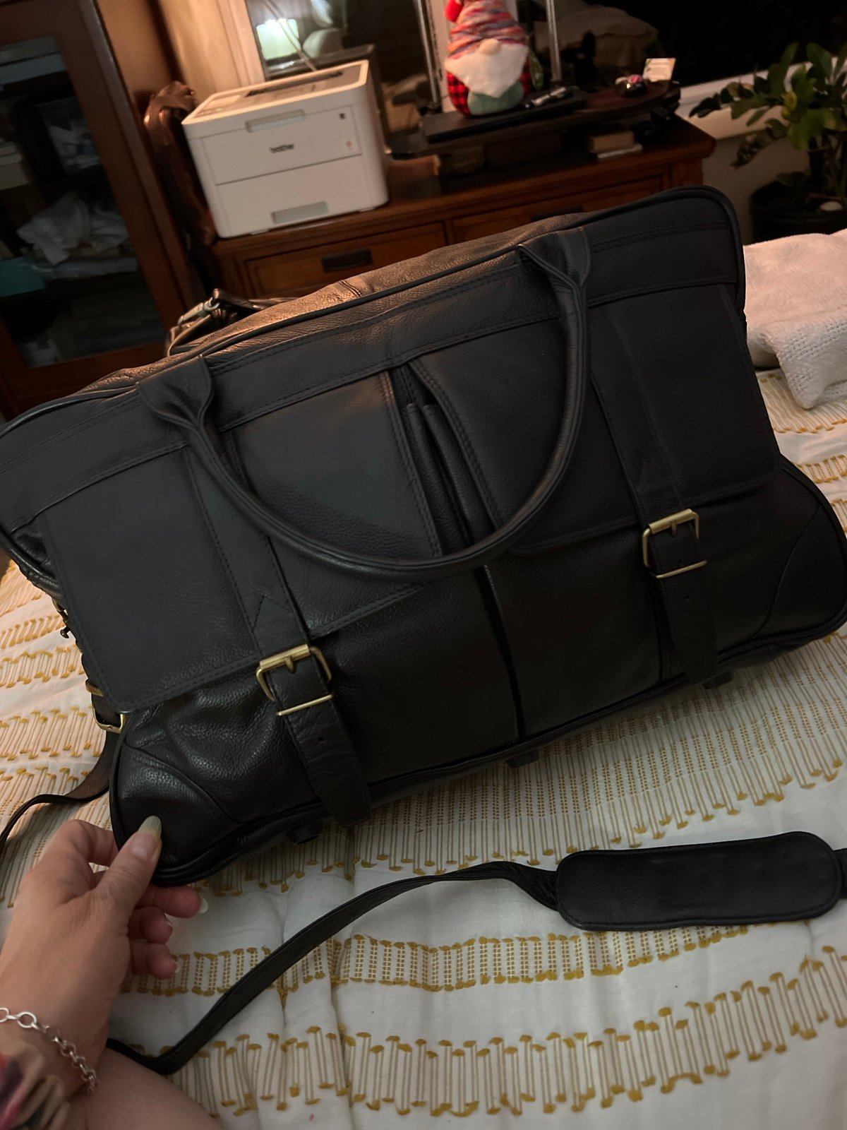 Black, all leather duffel travel bag, kind of padded on the inside like new