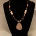 Exotic shell, tumbled glass and leather necklace