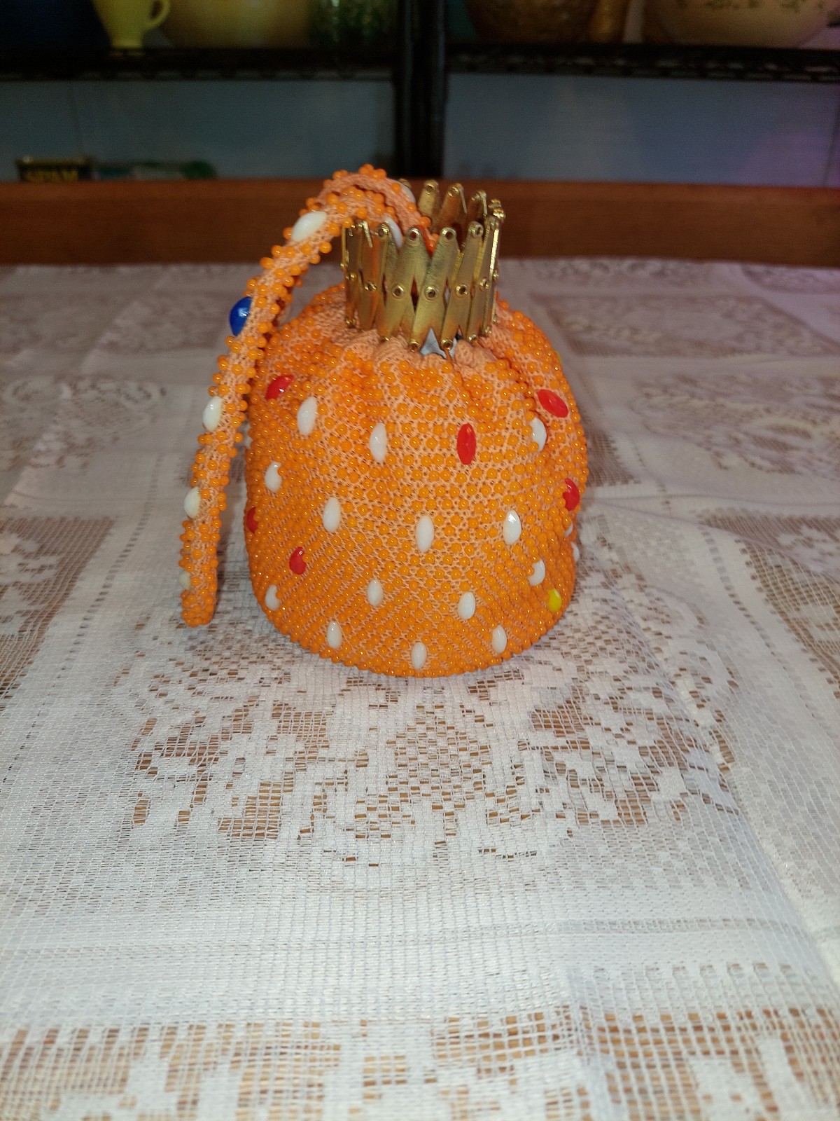 Beaded orange clutch