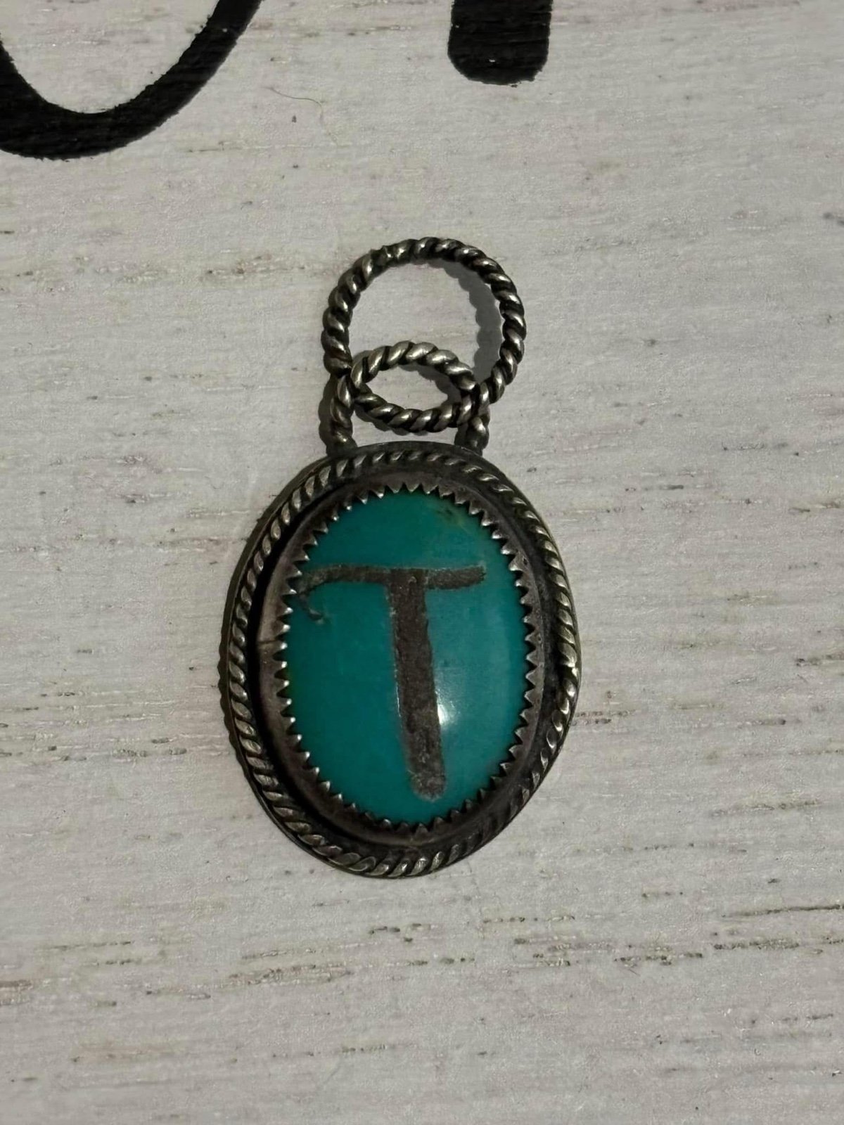 Etched ‘T’ Turquoise pendant