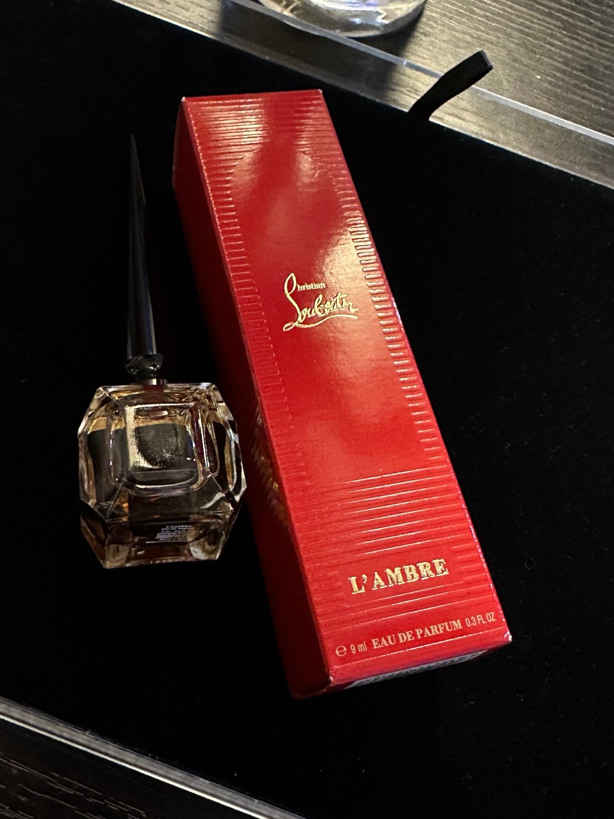 Christuan loubutin new with box L' Ambre 9ml.